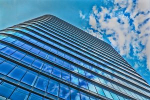 High-rise building looking up at the sky.